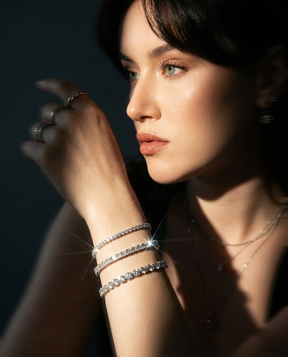 Model wearing stacked Caratleaf silver rings , Model wearing stacked Caratleaf tennis bracelets
